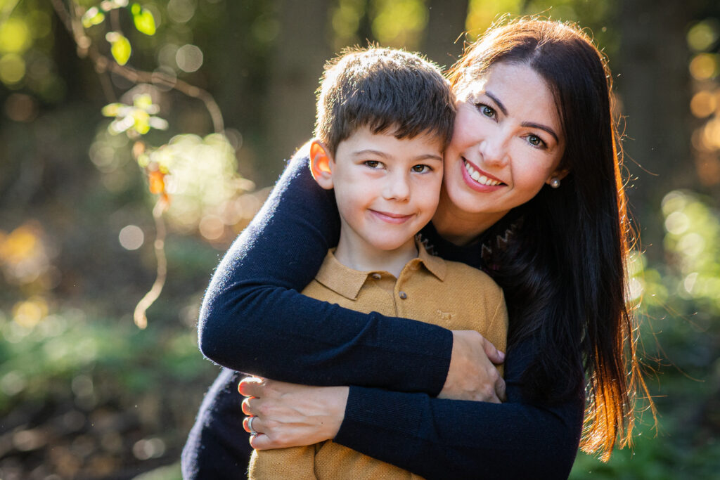 Autumn family photoshoot mum and son photo in Esher woods Surrey